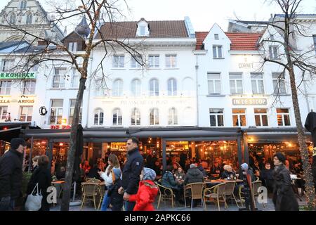 Restaurants at Christmas time on historical square Groenplaats, in central Antwerp, Belgium Stock Photo