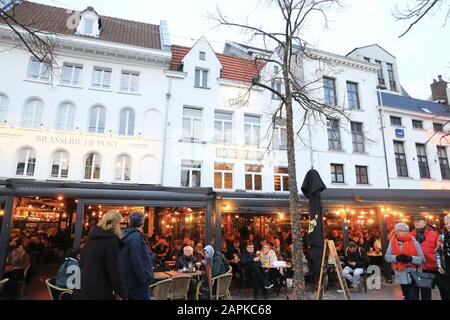 Restaurants at Christmas time on historical square Groenplaats, in central Antwerp, Belgium Stock Photo