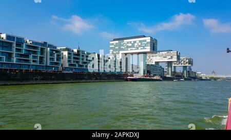 Rhine harbor in cologne with the crane houses buildings Stock Photo