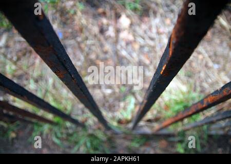 Old and rust grating in a park Stock Photo