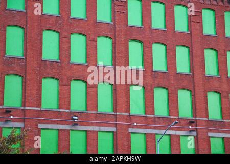 The red bricks and the green windows in Brooklyn Stock Photo