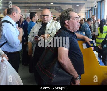 Havana, Cuba. 29th Feb, 2016. Airline passengers, frustrated by hours-long delays in their flight, wait in the international terminal of José MartÃ- International Airport in Havana, Cuba February 29, 2016. Airlines using the airport are the possible target of a lawsuit initiated by the family which formerly owned the facility. The lawsuit would be based on the Trump's decision to activate Title III of the Burton-Helms Act beginning Thursday May 2, 2019. It allows lawsuits against entities operating in properties that were expropriated by the Cuban government after the 1959 revolution. Stock Photo