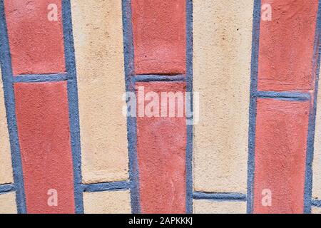 Brick wall of white and red shades close up Stock Photo