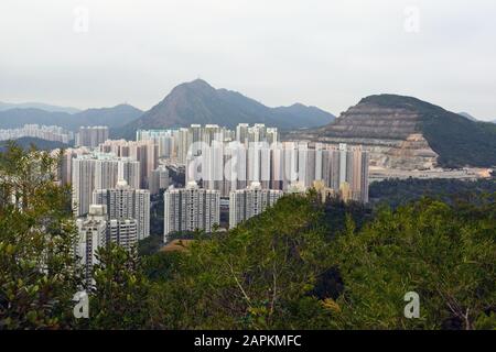 Overlooking apartments below the mountains outside of Hong Kong from Wilson's Trail. Stock Photo
