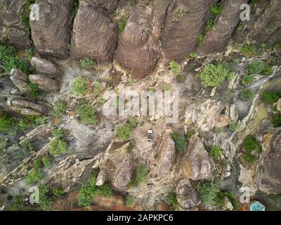 Burkina Faso, Aerial view of 4x4 car in Domes of Fabedougou Stock Photo