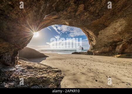 New Zealand, South Island, Tasman, Cave on Wharariki Beach Stock Photo