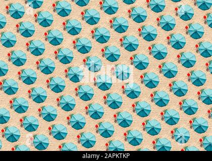 Aerial view of rows of turquoise colored beach umbrellas Stock Photo