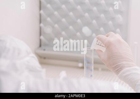 Close-up of a scientist working in laboratory Stock Photo