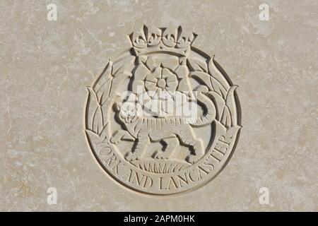 The York and Lancaster Regiment (1881-1968) regimental emblem on a World War I headstone at Tyne Cot Cemetery in Zonnebeke, Belgium Stock Photo