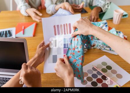 Fashion designers having a meeting in office Stock Photo
