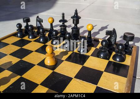 Dramatic closeup chess board pieces hi res stock photography and