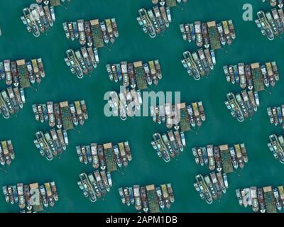 Indonesia, Bali, Aerial view of various ships moored in turquoise water Stock Photo