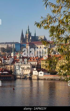 Czech Republic, Prague, Prague Castle and St. Vitus Cathedral seen across river Stock Photo