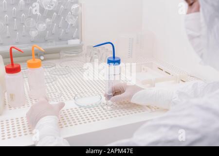 Close-up of scientist working in laboratory Stock Photo