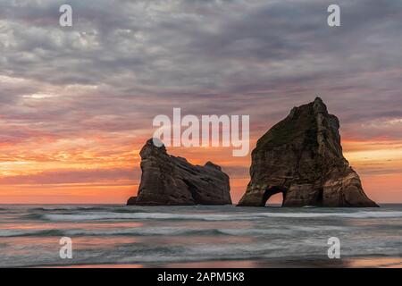 New Zealand, South Island, Tasman, Wharariki Beach and Archway Islands Stock Photo