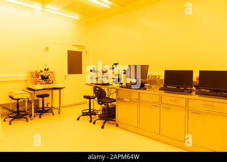 Interior of a laboratory in artificial yellow light Stock Photo
