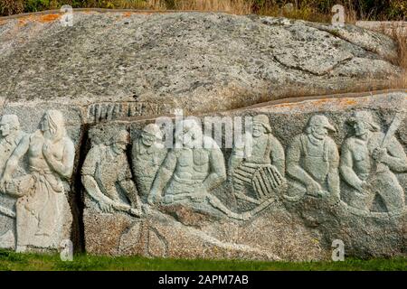 Memorial to local fishermen carved in granite near Peggys Cove village, Nova Scotia Stock Photo