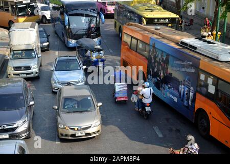 An overhead view of buses and cars in a vehicle traffic jam in central Bangkok, Thailand, Asia Stock Photo