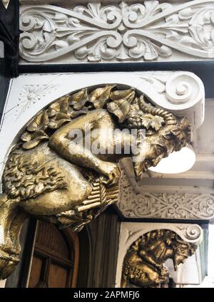 Two golden faun decorations claimed to have inspired C. S. Lewis in writing Chronicles of Narnia. Brasenose College entrance off St. Mary's Passage Stock Photo