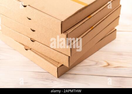 Cardboard box on a wooden background Stock Photo