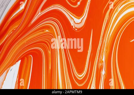 Abstract multi-colored paint background. Acrylic texture with marble  pattern. Wallpaper. Mixing paints. Modern art. Stock Photo
