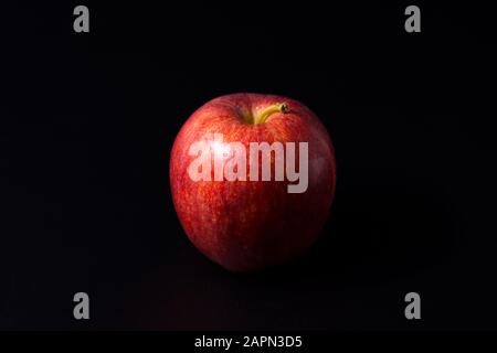 Red apple isolated on a black background Stock Photo