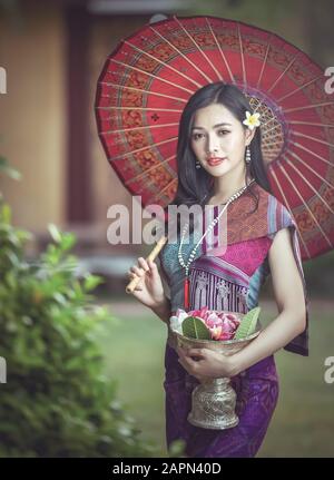 Beautiful Laos girl in costume, traditional Laos culture Stock Photo