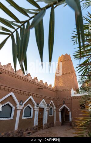 Historic and traditional mud mosque and minaret in Ushaiger heritage village, Saudi Arabia Stock Photo