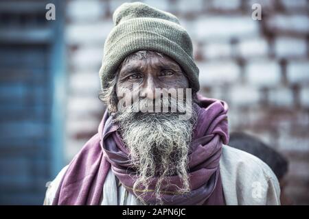 VARANASI, INDIA - Feburary 23,2018: Portrait of Shaiva sadhu, holy man on the ghats of the Ganges river in Varanasi, India Stock Photo