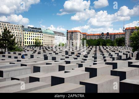 BERLIN, GERMANY - MAY 25, 2018: Visitors at the Memorial to the Murdered Jews of Europe, also known as Holocaust Memorial, in Berlin, Germany Stock Photo