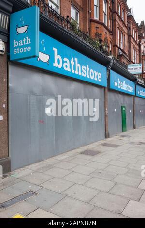A boarded-up Bathstore shop front on Finchley Road, London, UK Stock Photo