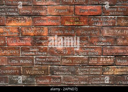 Bricks displaying names of artists who have appeared at the famous Cavern Club in Mathews Street, Liverpool, UK Stock Photo