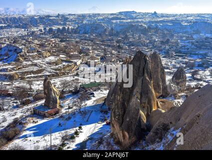 Cappadocia. Turkey. View from mountain on the unusual winter landscape with cliffs at morning time Stock Photo