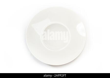 A white deep plate on a white background in a top view Stock Photo