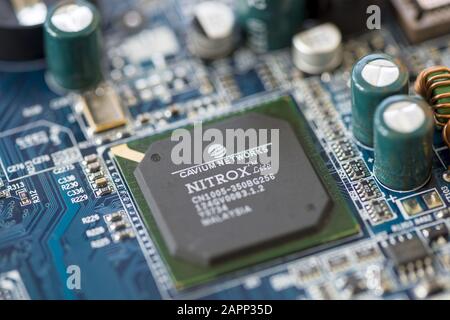 TIMISOARA, ROMANIA - MARCH 30, 2019: Close-up of a Cavium Networks Nitrox microprocessor Stock Photo