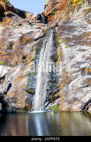 Colorfull River waterfall in mountain. Waterfall mountain wall scene. Mountain waterfall view Stock Photo