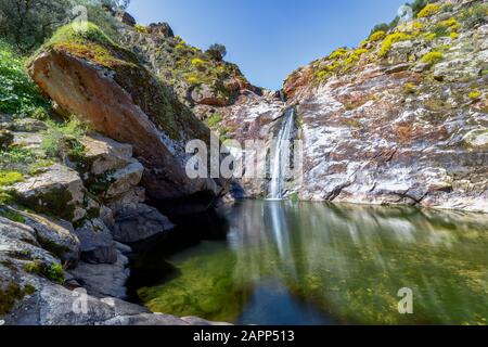 Colorfull River waterfall in mountain. Waterfall mountain wall scene. Mountain waterfall view Stock Photo