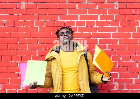 African American man student passed the exams and happy thanks God Stock Photo