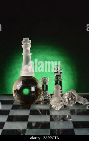 Chess glass pieces on the chessboard Stock Photo