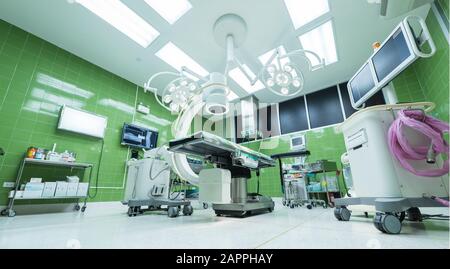 Equipment and medical devices in modern operating room Stock Photo