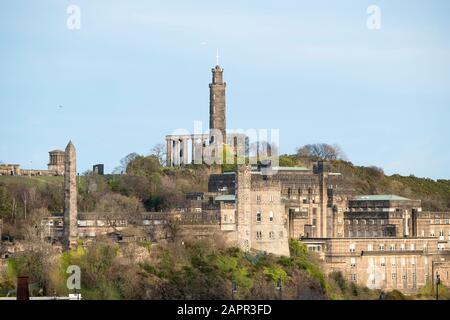 Historic buildings on Calton Hill, Edinburgh: The Martyrs Monument, Nelson's monument, St Andrews House and Governors House of the old Calton Jail. Stock Photo