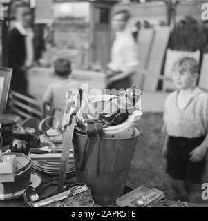 Spoons and forks match on the VVA site. A football match of two neighbourhood associations where the entrance price was household goods, given in need of Arnhem. Date: August 1945 Location: Amsterdam, Noord-Holland Keywords: collections, sports, football, reconstruction Stock Photo