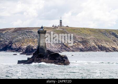 The inner end of the Raz., looking from the sea and Phare de la Vielle towards the Lighthouse onshore Stock Photo