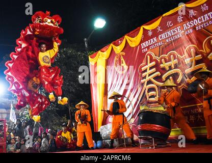 Performers performing the Dragon dance on the occasion of the Chinese New Year festival in Kolkata, India. Stock Photo