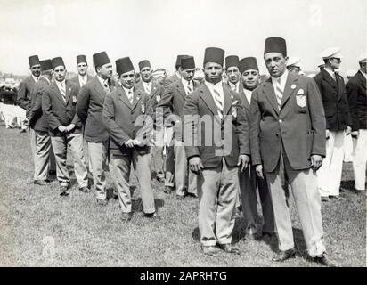 Sports. 1928 Olympic Games Amsterdam, opening ceremony on 28 July, entry Turkish athletes into the stadium. It is striking that a fez is part of the costume. Stock Photo