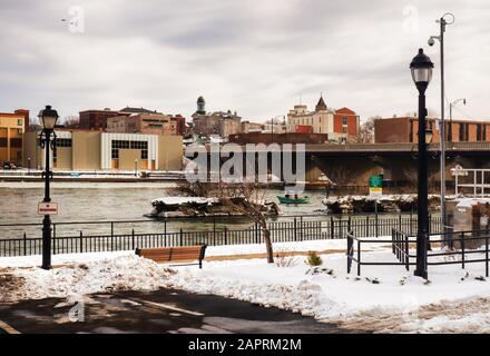 Oswego, New York, USA. January 23, 2020. The Oswego River with the city of Oswego, NY in the distance on a winter afternoon Stock Photo