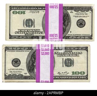 Two stacks of wrapped one hundred dollar bills in US paper money currency on an isolated white background. Stock Photo