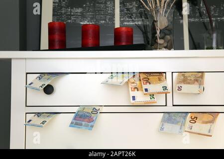 Money stored in drawers means insecurity and danger for savers Stock Photo