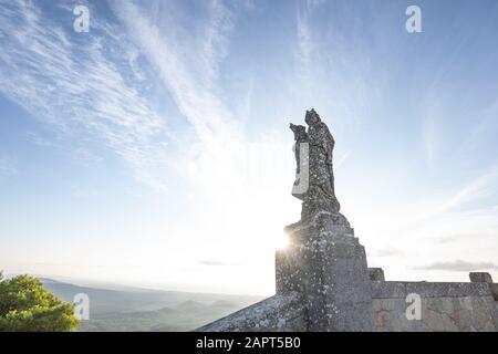 statue of Christ standing on a pedestal, The Balearic islands, Spain Palma de Mallorca, huge old statue on a hill, Stock Photo