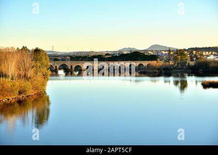 Roman Bridge in Merida, Spain, on the Guadiana river. Built in the 1st century BC. It has a length of 790 meters Stock Photo